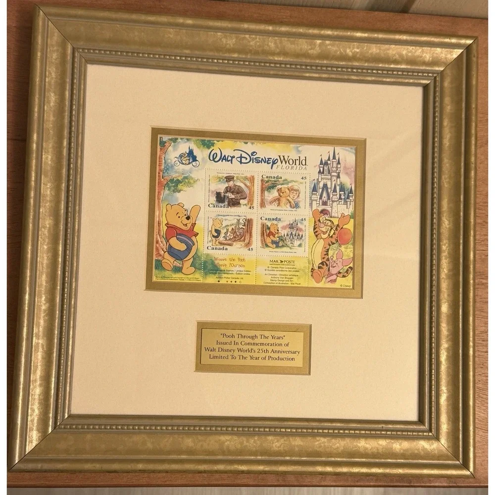 POOH THROUGH THE YEARS COMMEMORATION OF DISNEY WORLDS 25TH ANNIVERSARY COA FRAME